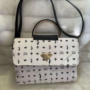 Baby Phat black and white logo satchel/shoulder bag with gold tone accent.